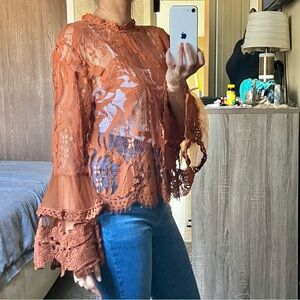 Burnt orange sheer lace blouse